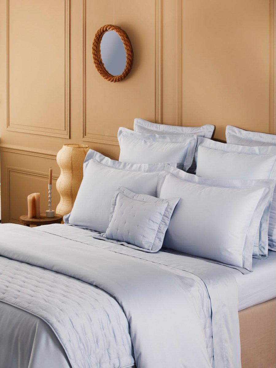 Triomphe Celeste Blue Quilted Coverlets by Yves Delorme