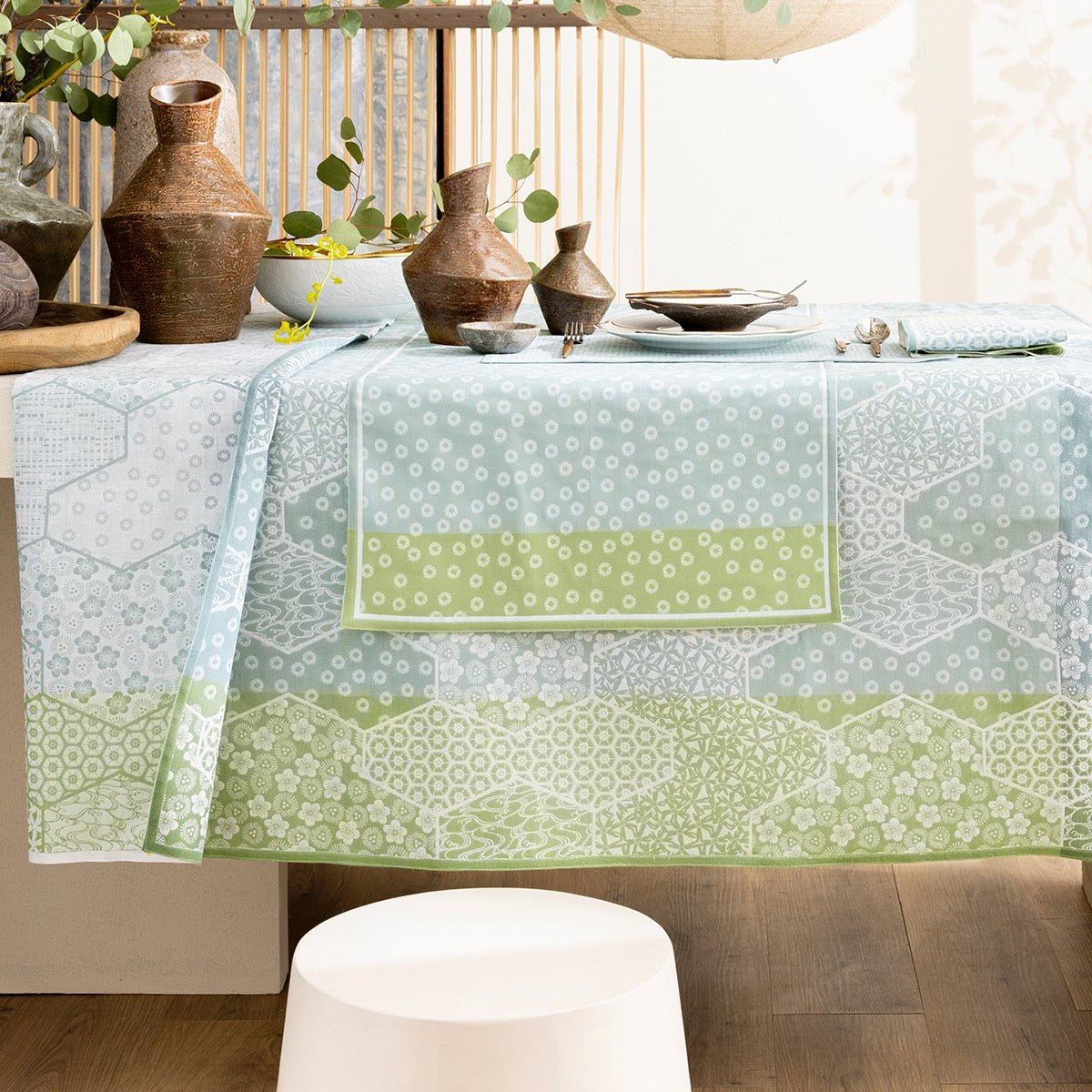 Wagara Green 69" x 126" Coated Tablecloth by Le Jacquard Français