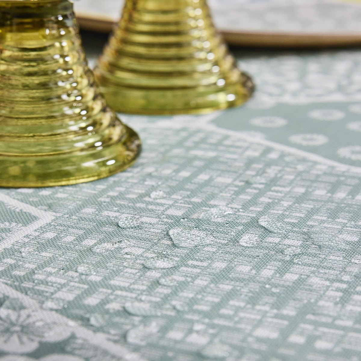 Wagara Green 59" x 86" Coated Tablecloth by Le Jacquard Français