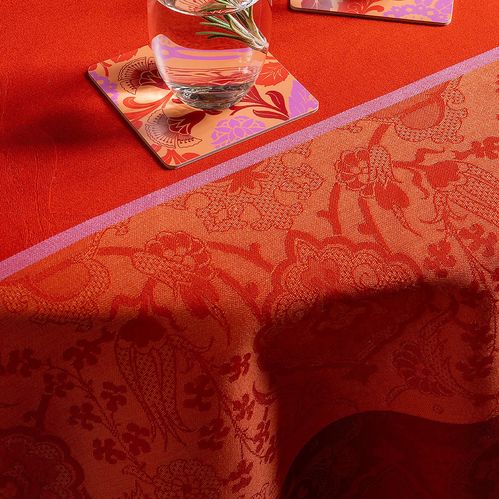Voyage Iconique Enduit Red Coated Tablecloth By Le Jacquard Francais